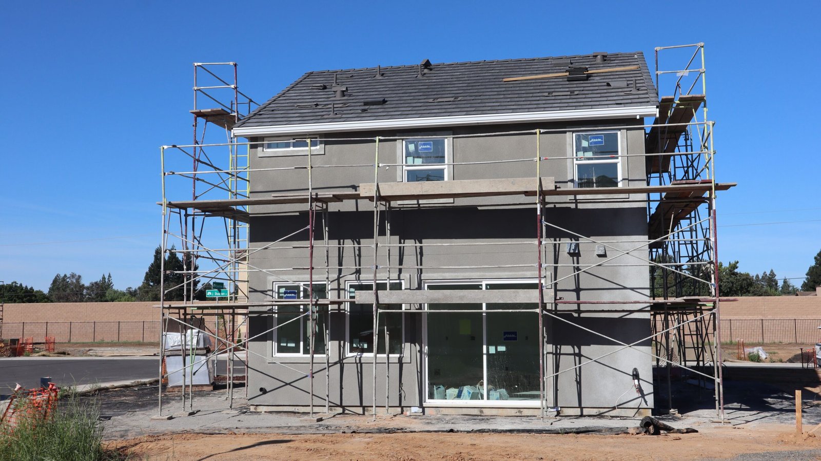 Home Scaffolding surrounds a new home under construction in Elk Grove, California.