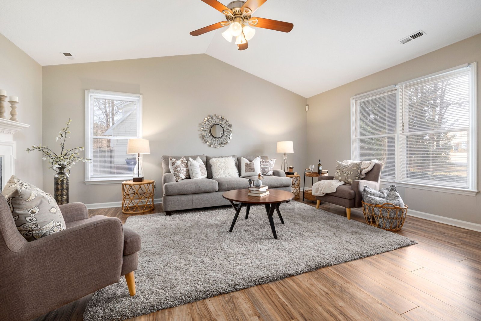 Home Bright and modern living room featuring cozy furnishings and natural lighting.